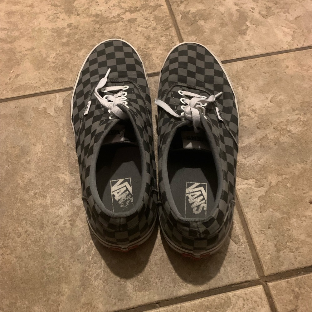 Grey and white checkered low top Vans